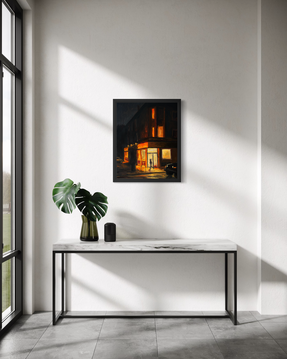 "Corner Store" original oil painting by John Wellington — framed in a sunlit entryway above a marble console table
