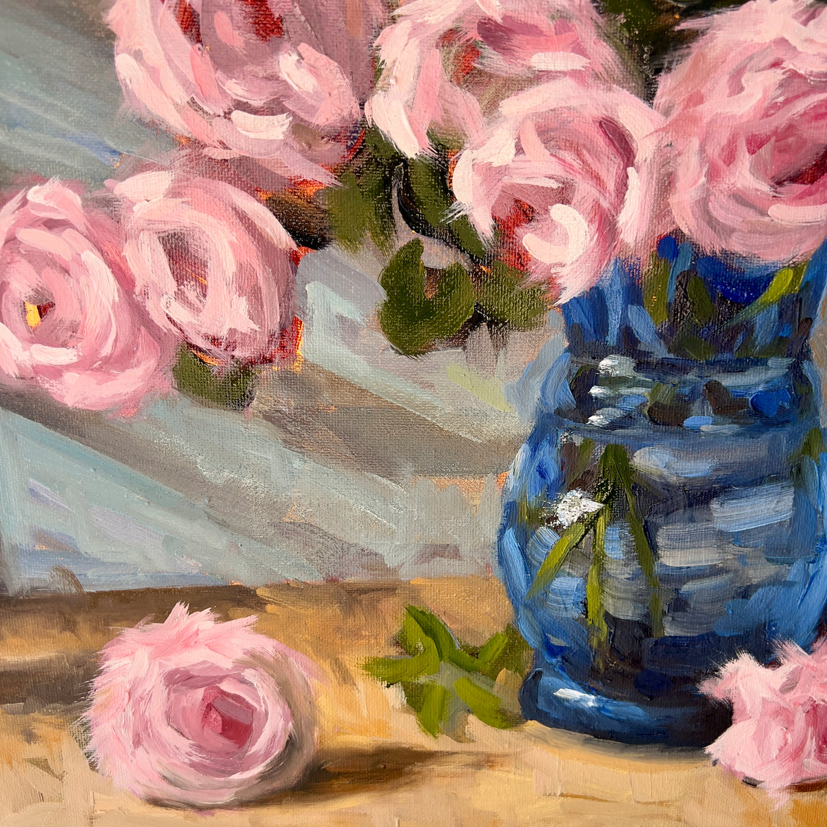 "Pink Roses" original oil painting by John Wellington — close-up detail of the blue glass vase and fallen rose