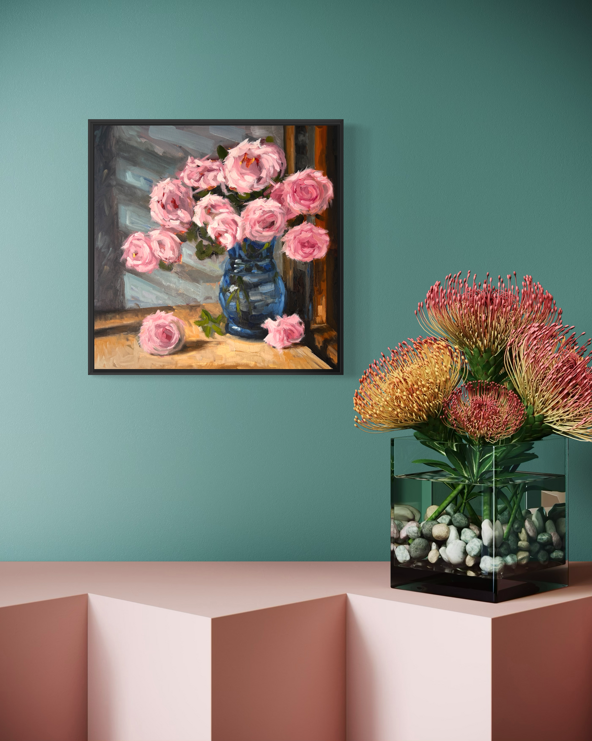 "Pink Roses" original oil painting by John Wellington — framed on a teal wall above a pink pedestal with protea flowers